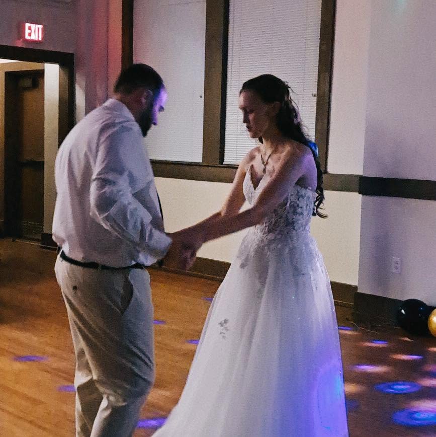 Malachi and Abigail Moulden dancing together at their wedding